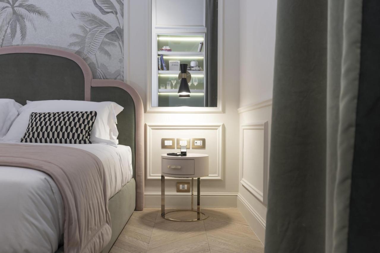 Hotel La Gemma Florence Extérieur photo A bedroom at the hotel